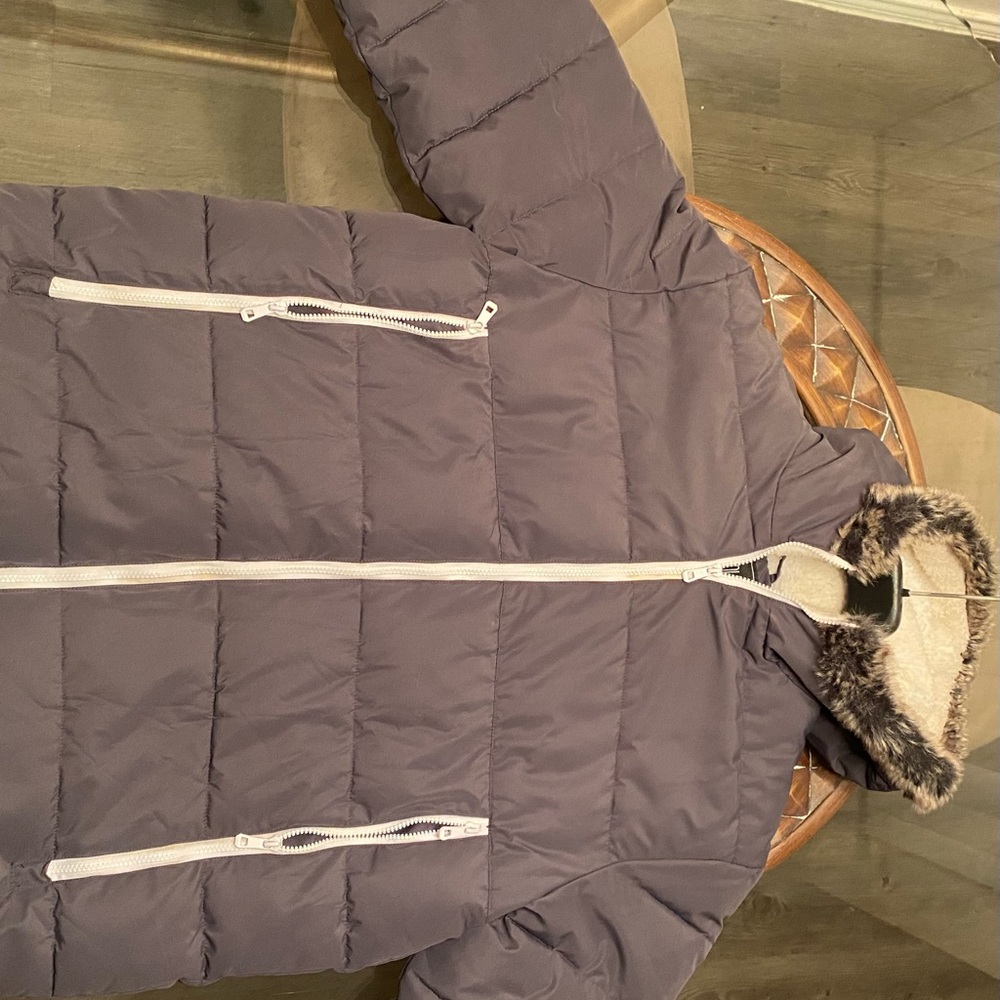 gray puffer with fur hood.